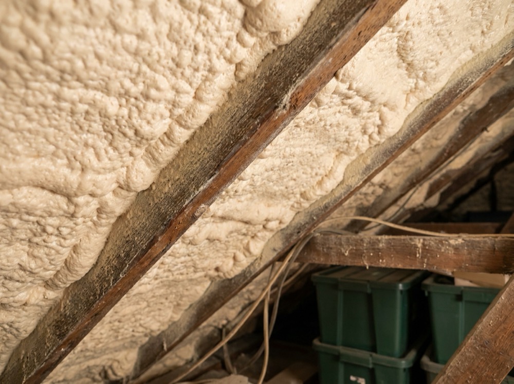 Close-up of spray foam insulation on the underside of a UK roof